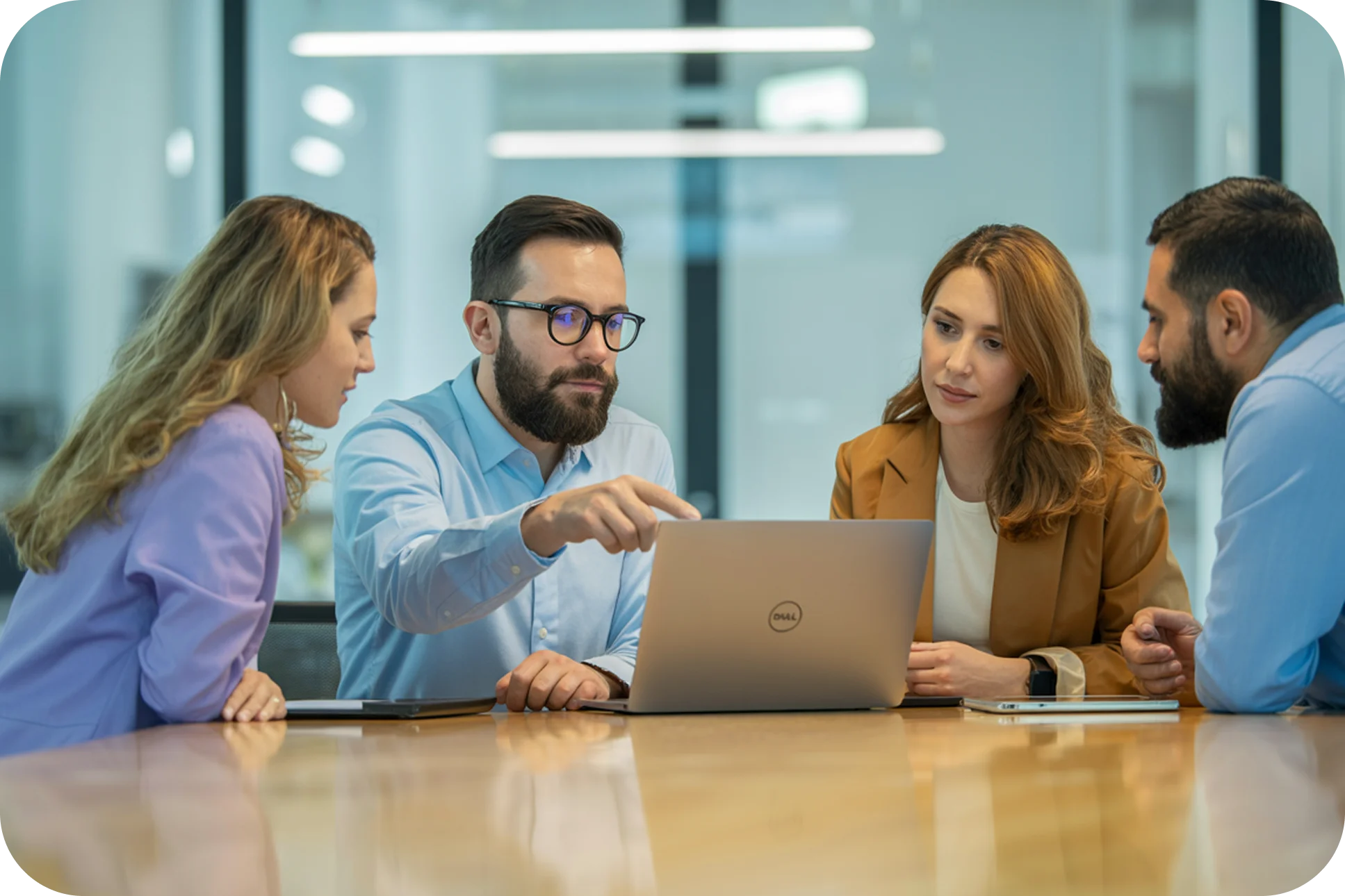 image of Team of colleagues focused on laptops, working on a research project