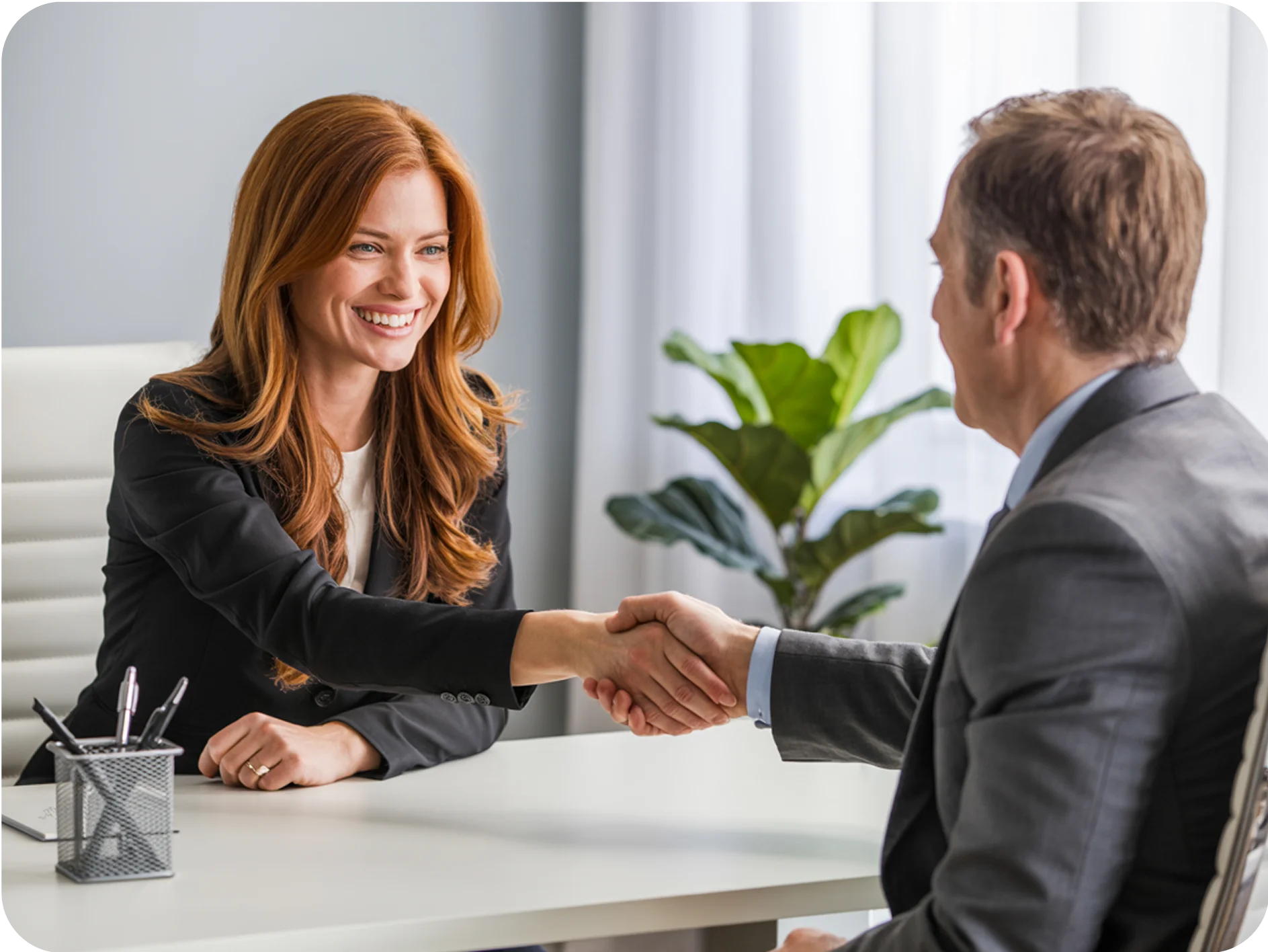 image of Man and woman shaking hands